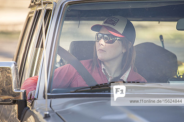 Woman in a Land Cruiser in Yellowstone Country.