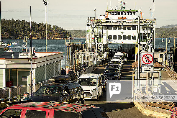 Cars Driving Off The Ferry Into Harbor On San Juan Island  Washington  Usa