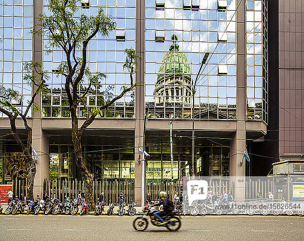 Street and reflection of exterior of Palace of the Argentine National Congress in Buenos Aires  Argentina