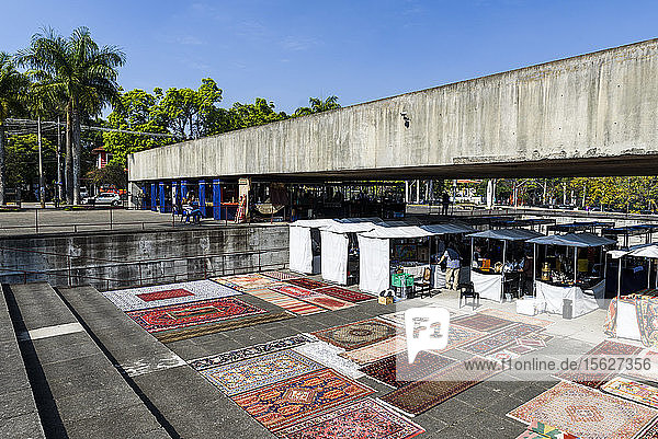 Rugs and market stalls at antique market in Mube Museum