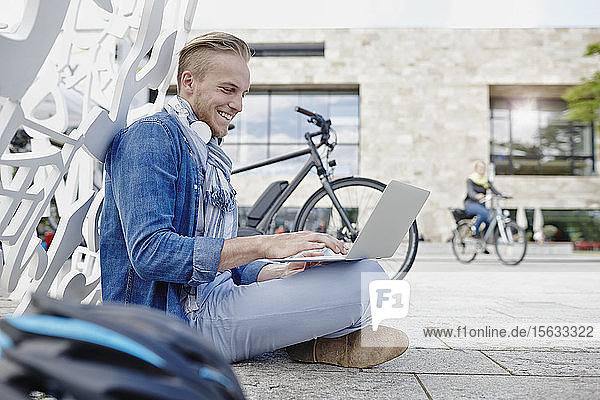 Student using laptop at Goethe University in Frankfurt  Germany
