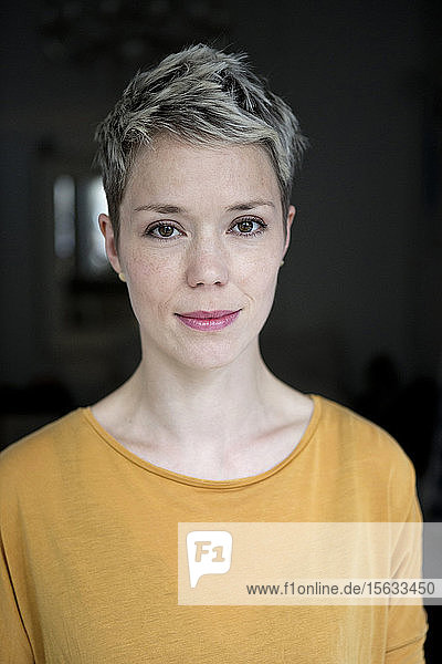 Portrait of woman with dyed short hair