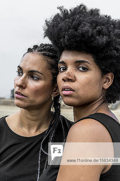 Portrait of two women with black hair