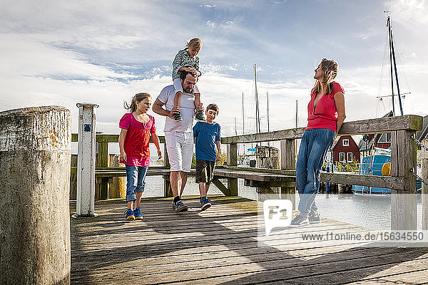 Family on a pier  Ahrenshoop  Mecklenburg-Western Pomerania  Germany