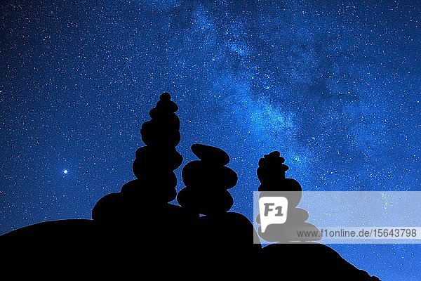 Stonemen in front of Milky Way  Ribeira da Janela  Porto Moniz  Madeira Island  Portugal  Europe