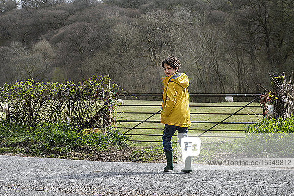 Boy playing in countryside