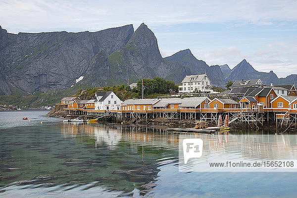 Rorbu traditional fishing huts used for tourist accommodation in village of Reine Moskensoya Lofoten Islands Norway