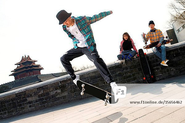 Young people skateboarding