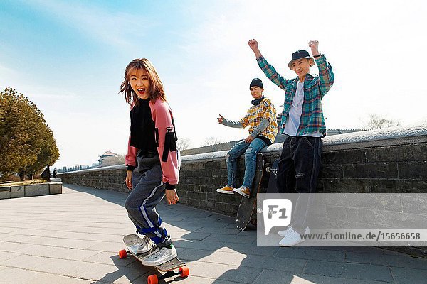 Young people skateboarding