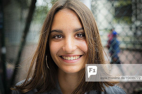Close-up of smiling teenage girl