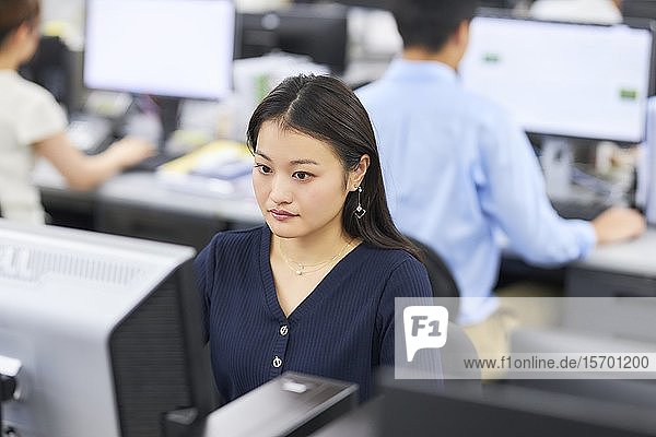 Japanese woman working in the office