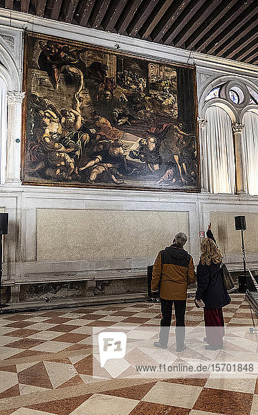 Italy Veneto Venice Scuola Grande di San Rocco tourists admire the works of Tintoretto in the school of the sacred Rochus