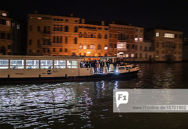 Italy  Veneto  Venice  Canal with Vaporetto at night