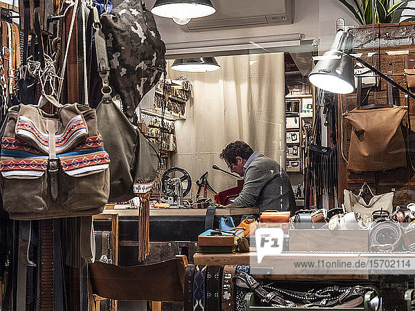 Italy  Veneto  Venice  Male worker in leather workshop