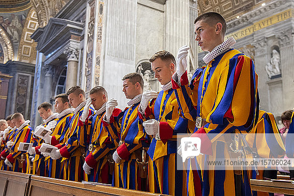 Holy Mass at the altar of the Chair of St. Peter's Basilica for the 23 new guards who will take the solemn oath  Vatican City  Rome  Lazio  Italy  Europe