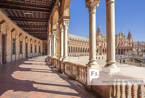 Under the arches of the semicircular Plaza de Espana  Maria Luisa Park  Seville  Andalusia  Spain  Europe