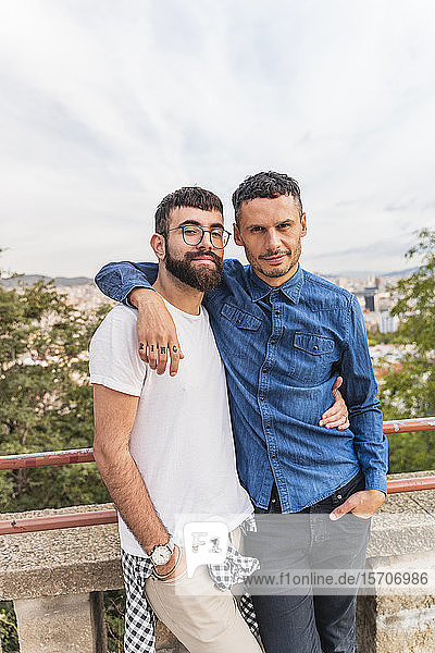 Portrait of Back view of gay couple arm in arm  Barcelona  Spain
