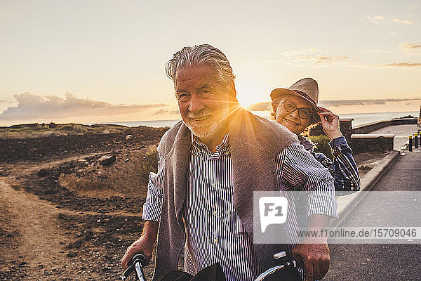 Happy active senior couple on bicycle  Tenerife