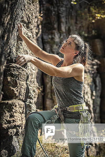 Woman preparing to climb