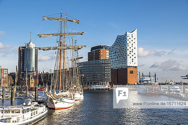 Germany  Hamburg  Sailing ship moored in harbor with Elbe Philharmonic Hall in background