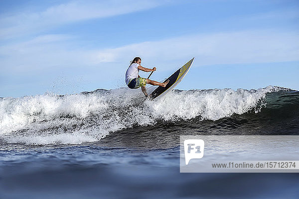 SUP surfer Bali Indonesia