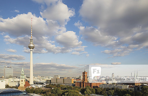 Germany Berlin Clouds over Berlin TV Tower and surrounding city buildings