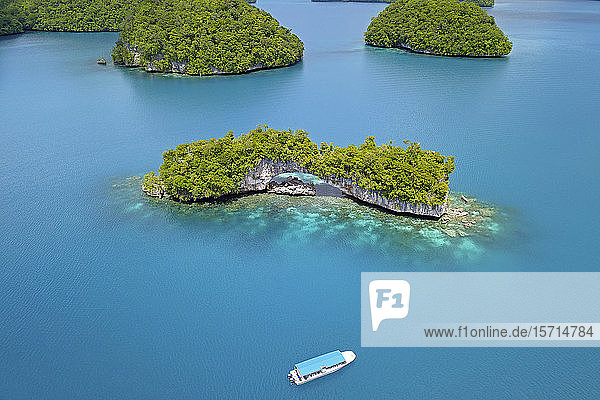 Palau  Aerial view of tour boat near Rock Islands