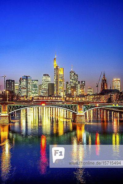Germany  Hesse  Frankfurt  City skyline across Main river at dusk