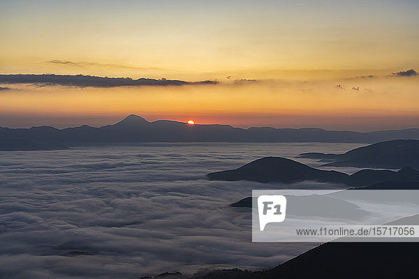 Italy  Thick fog shrouding Monte San Vicino at autumn sunrise