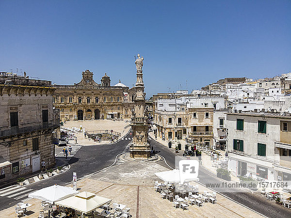 Italy  Province of Brindisi  Ostuni  Clear sky over town square and Spire of SantOronzo