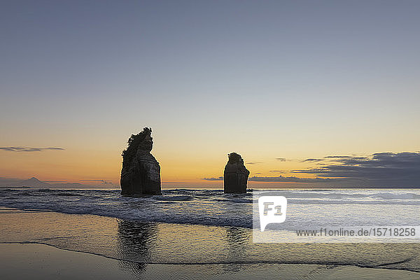 New Zealand  New Plymouth District  Tongaporutu  Three Sisters rock formation at dusk