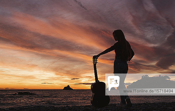 Hawaii Oahu North Shore Silhouette Of Nude Woman With A Pareo On The Beach At Sunset