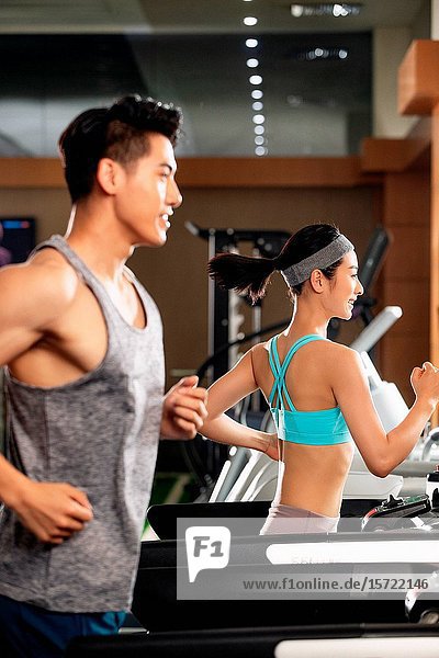 Young people in the gym to work out