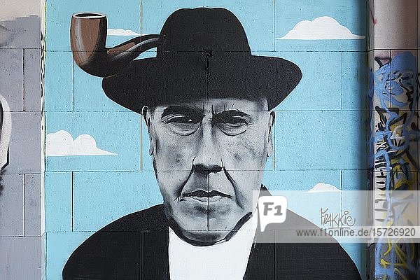 Portrait of the painter René Magritte  with pipe  graffito  street art  Brussels  Belgium  Europe