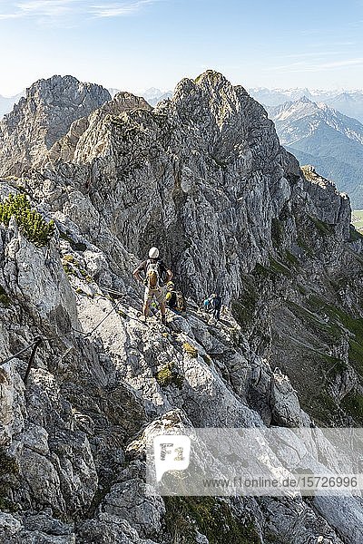Mountaineer on a secured fixed rope route  Mittenwald via ferrata  Karwendel Mountains  Mittenwald  Germany  Europe