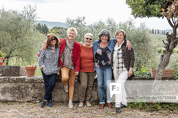 Portrait of senior women  olive trees in background  Florence  Italy