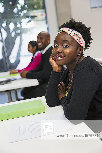 Portrait smiling  confident female community college student in classroom