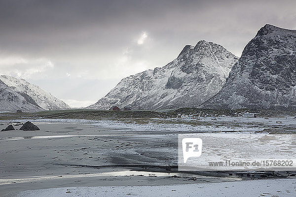 Scenic view snow covered mountains Skagsanden Lofoten Norway