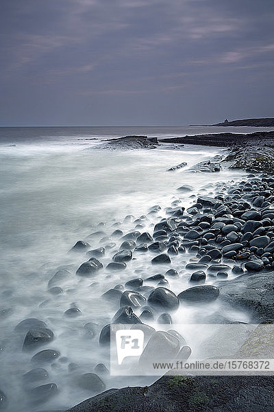 Rocks mystical ocean Cullernose Point Craster Northumberland UK