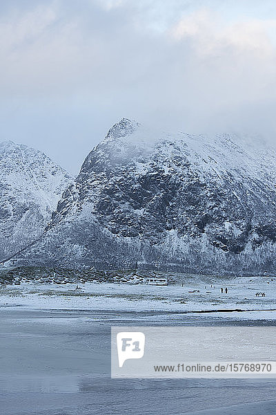 Snow covered mountain landscape Skagsanden Lofoten Norway