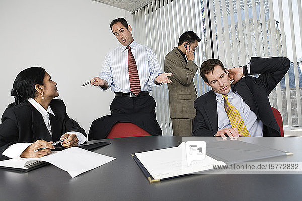 View of businesspeople in an office.