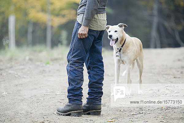Man standing with dog