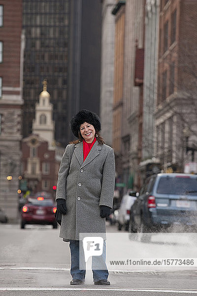 Portrait of a woman standing on a city street; Boston  Massachusetts  United States of America