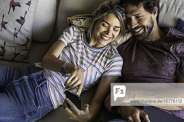 Couple using smart phone