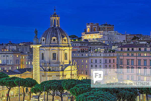 Trajans Column (Colonna Traiana) and Chiesa del Santissimo Nome di Maria al Foro Traiano at blue hour elevated view Rome Lazio Italy Europe