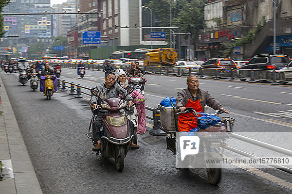 View of motor cyclists in Xi'an city centre  Xi'an  Shaanxi Province  People's Republic of China  Asia