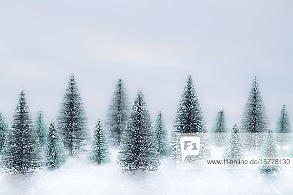 Christmas tree ornaments in snow
