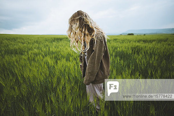 Woman wearing jacket in field in Crimea Ukraine