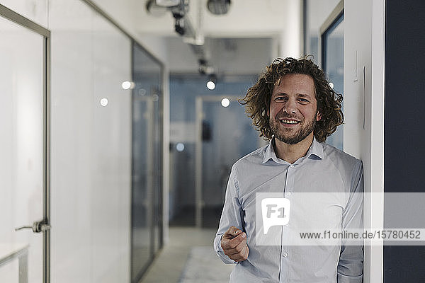 Portrait of confident businessman in office