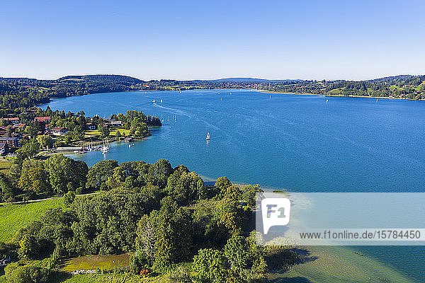 Germany  Bavaria  Bad Wiessee  Aerial view of Tegernsee lake and lakeshore town in summer